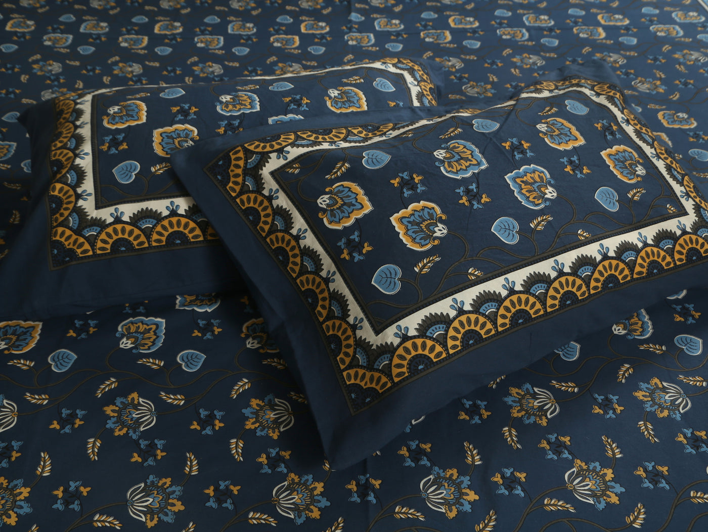 blue bedsheet with 2 pillow covers