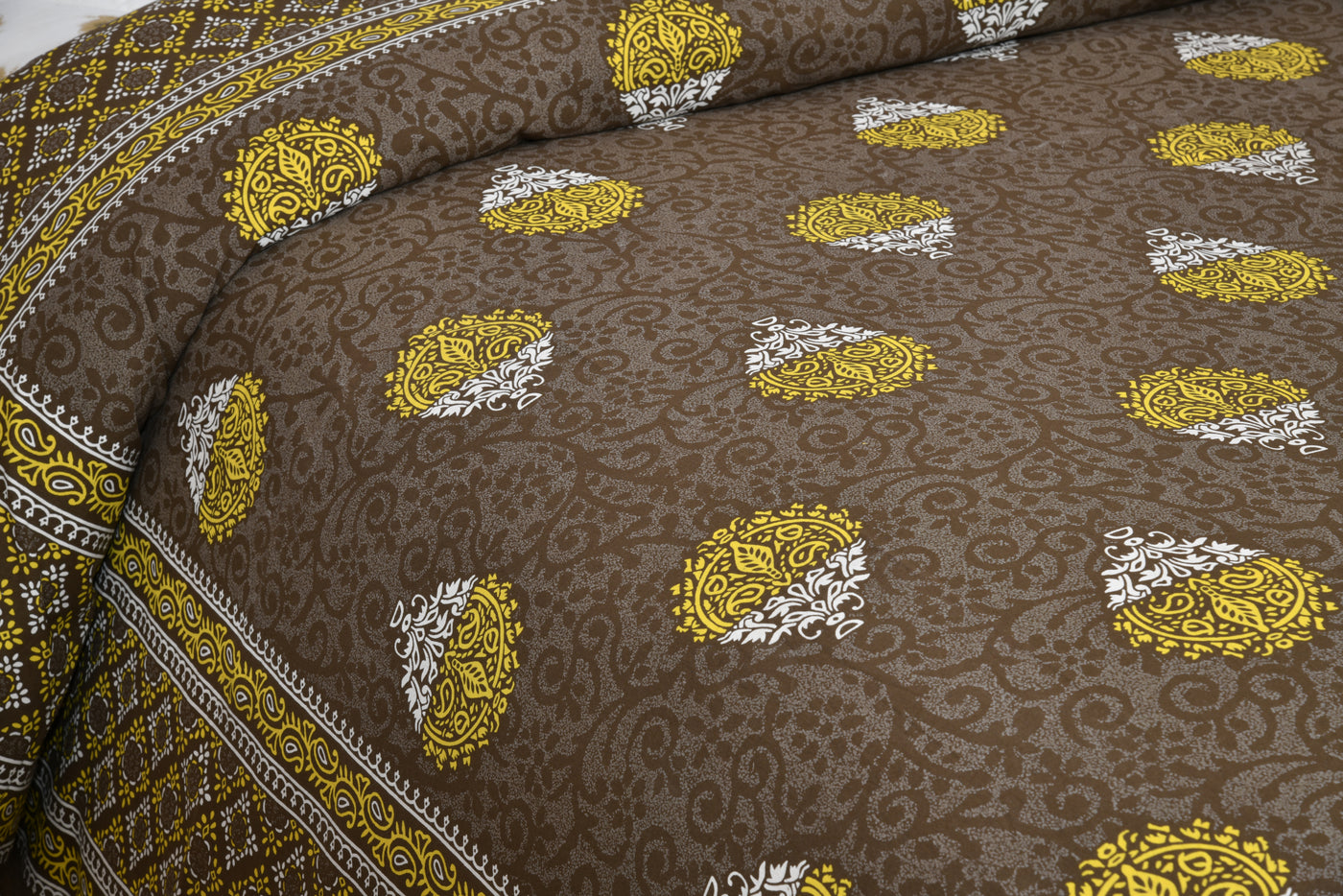 Brown color bedsheet with floral design