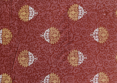 Floral design on coffee color bedsheet